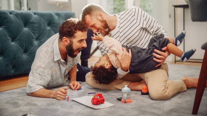 new fathers play with son