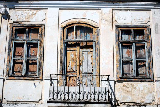 Very old widows with paint flaking off
