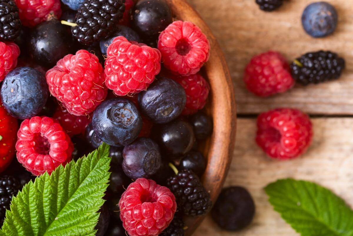 Blueberries, strawberries, and raspberries, common UK seasonal berries rich in antioxidants