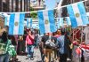 Family Holidays to Buenos Aires: Parks, Museums, Food and City Adventures with Children Buenos Aires / Argentina - 11/10/2019: Famous markets in San Telmo, oldest part of Buenos Aires decorated with Argentinian flags