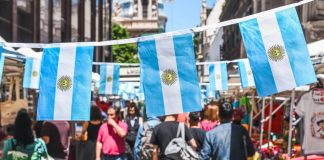 Buenos Aires / Argentina - 11/10/2019: Famous markets in San Telmo, oldest part of Buenos Aires decorated with Argentinian flags