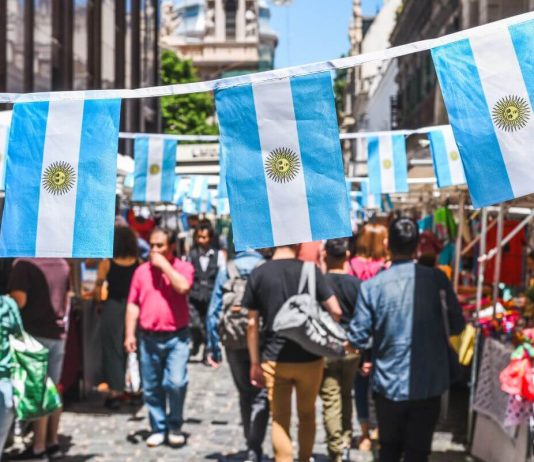 Buenos Aires / Argentina - 11/10/2019: Famous markets in San Telmo, oldest part of Buenos Aires decorated with Argentinian flags