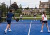 kids playing padel on a court in the uk